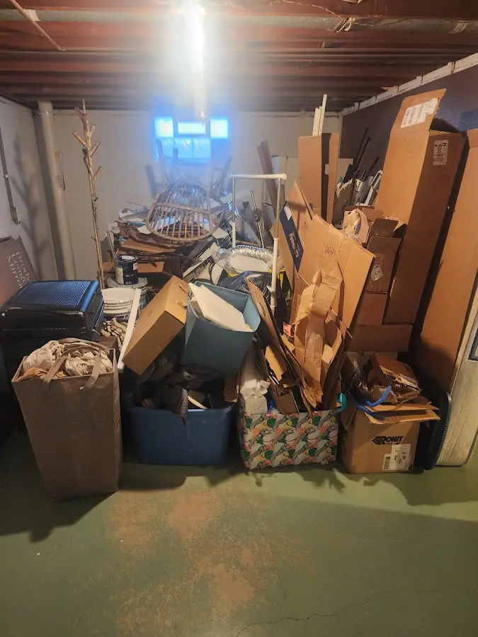 Roll-off dumpster container at job site for 2 Yard Dumpster Rental in Buenaventura Lakes